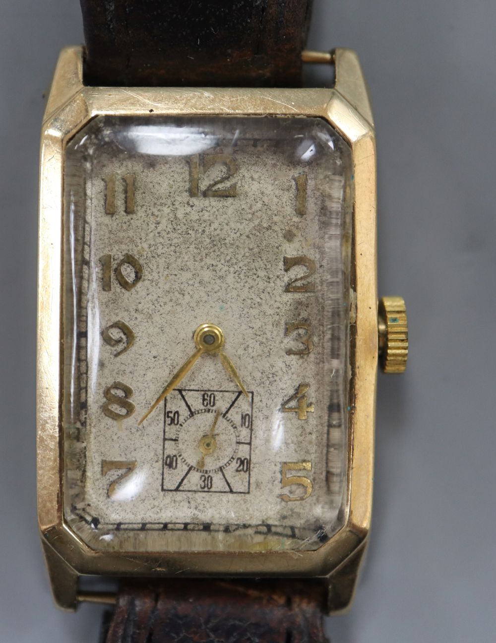 A gentlemans 1930s 9ct gold rectangular dial wrist watch, with Arabic dial and subsidiary seconds, on leather strap,